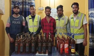 তাহিরপুরে বিদেশি মদসহ কারবারি আটক