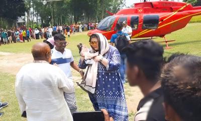 বিদেশি বউ নিয়ে হেলিকপ্টারে বাড়ি ফিরলেন সিঙ্গাপুর প্রবাসী