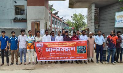 মোটরসাইকেলের অতিরিক্ত কর প্রত্যাহারের দাবিতে পূর্বধলায় মানববন্ধন
