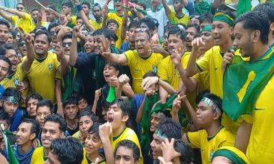 দিনাজপুরে বৃষ্টি উপেক্ষা করে ব্রাজিল সমর্থকদের শোভাযাত্রা